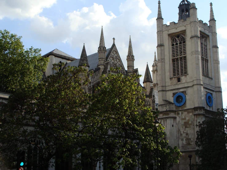 a very tall building with a large tower with a clock