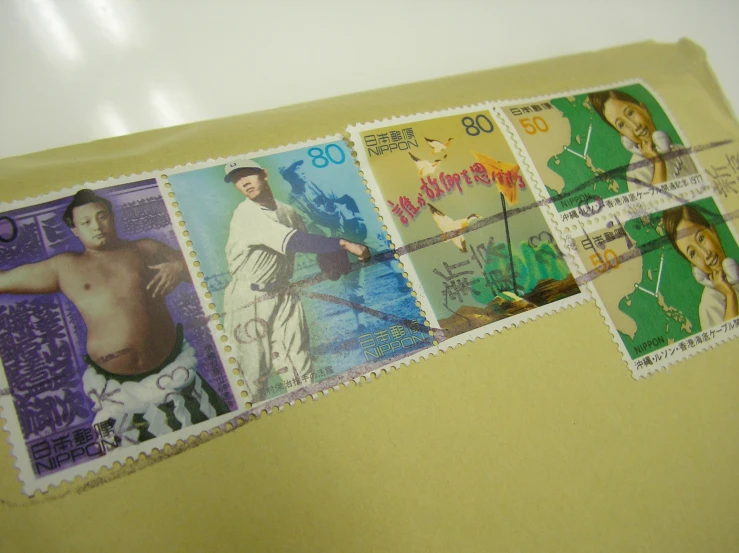 a sheet of stamps has a sailor on one side and some soldiers on the other