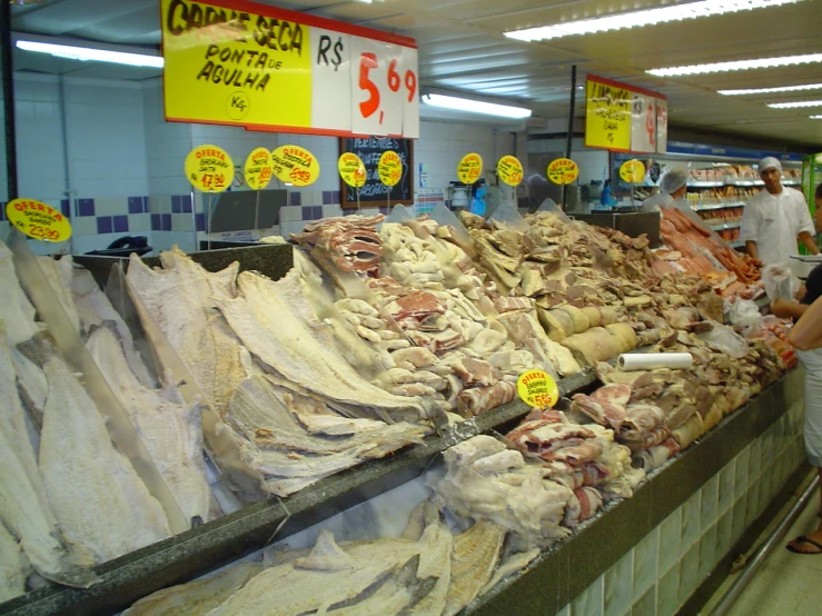 the inside of a market filled with dead meat