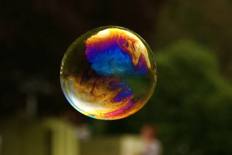 there is a soap bubble floating in the air