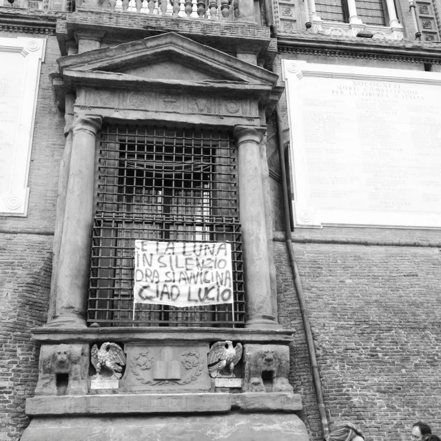 black and white po of an old building with iron bars