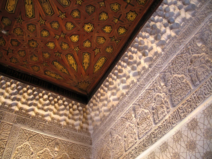 ornate, tiled wall and ceiling in the alham of a palace