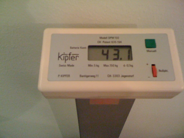 a digital scale displays the time to go in