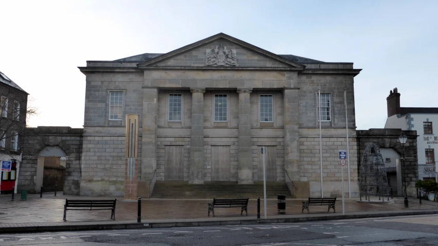 a building with several benches sitting in front