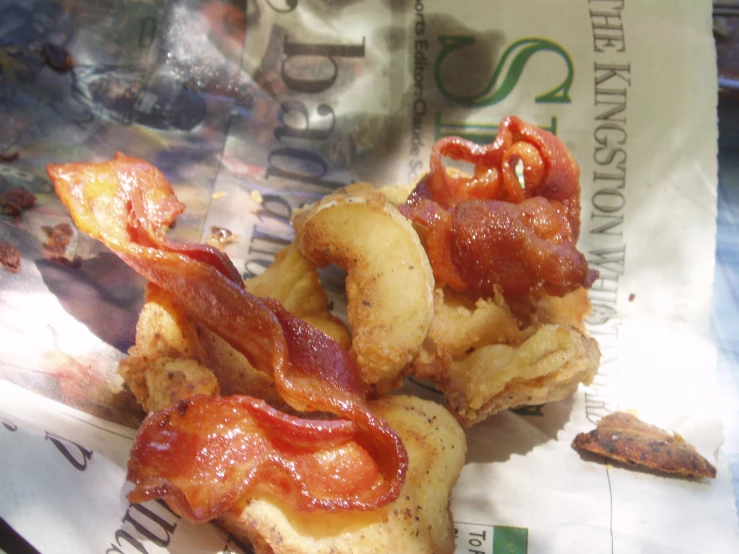 some bacon on some kind of snacks in the wrapper