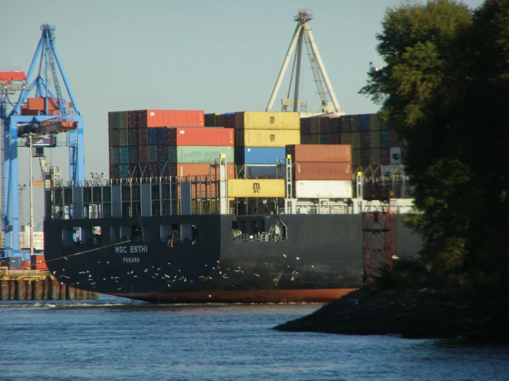 a large ship is docked at the port of oakland