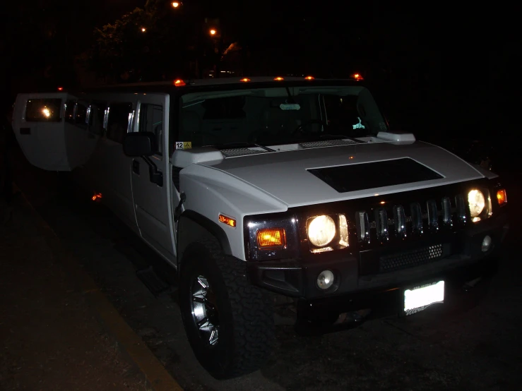 a hummer truck that is driving on the street