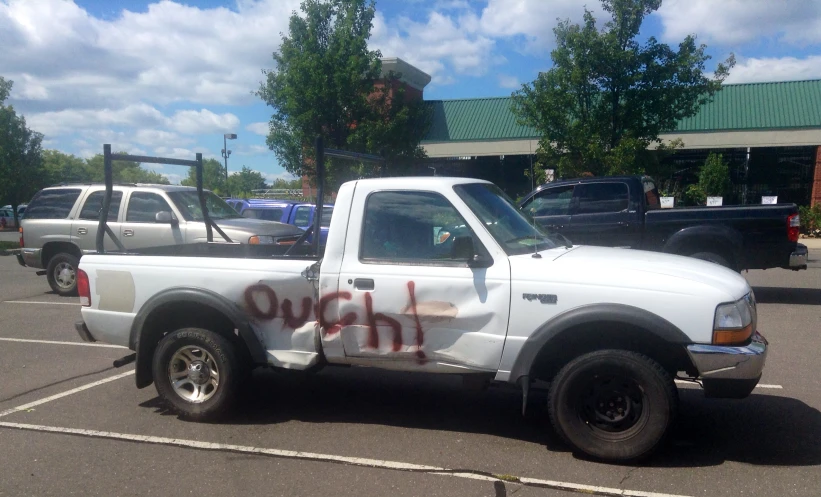 the truck is tagged with writing in it