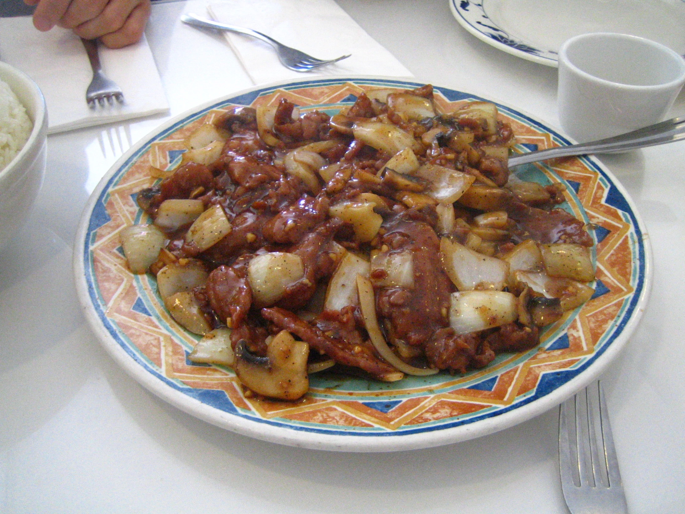 an image of a plate of food with meat