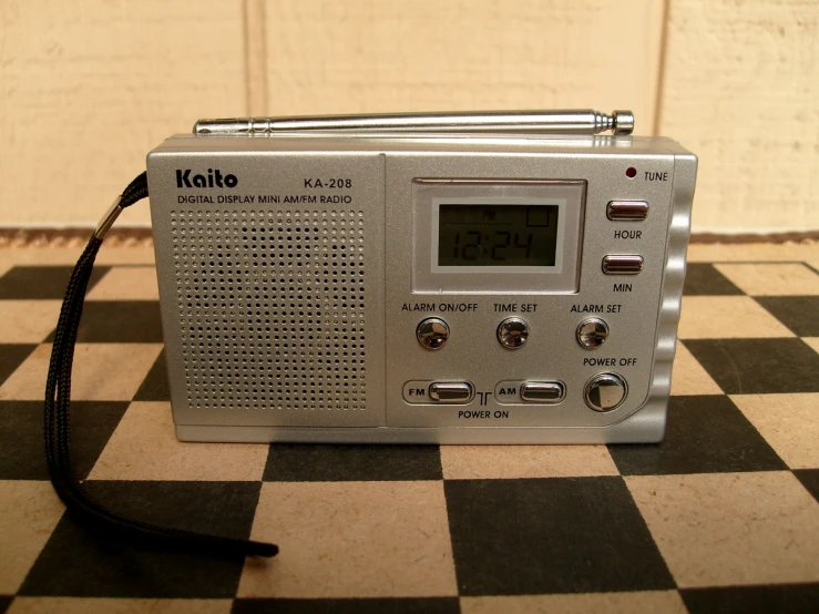 there is a radio that is on top of a table