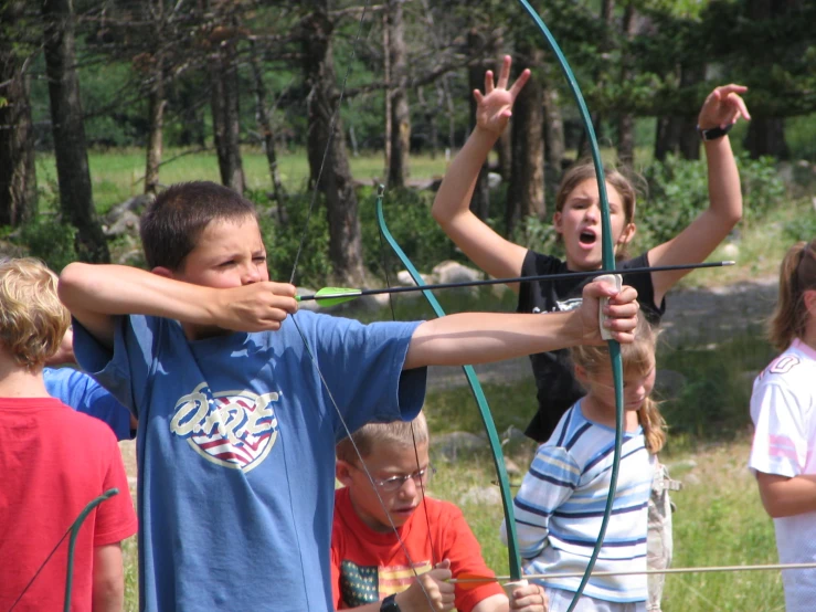 a bunch of s that are playing with some arrows