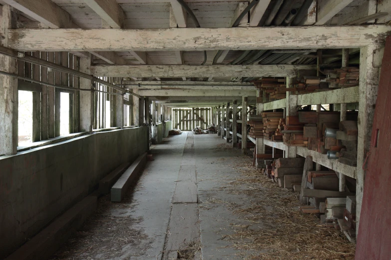 the inside of an old barn with a bunch of bricks