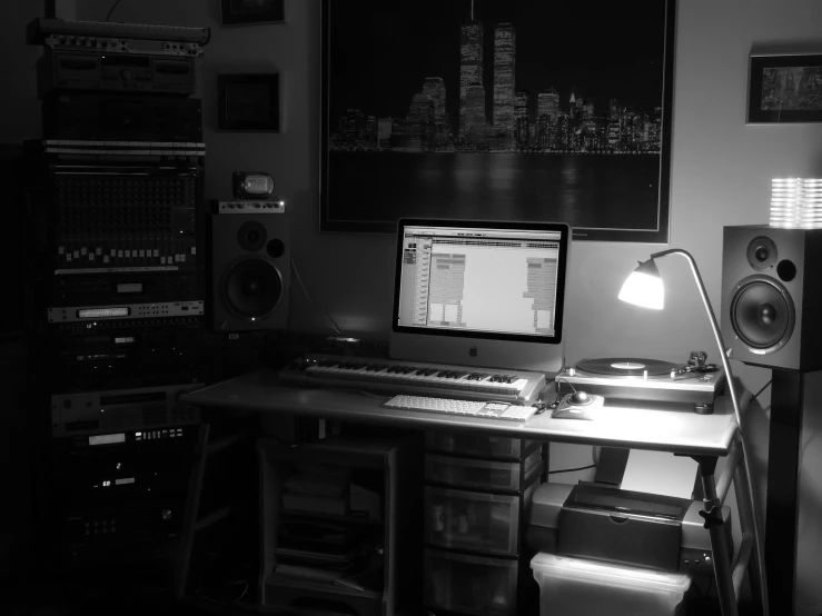a home recording studio setup with sound equipment