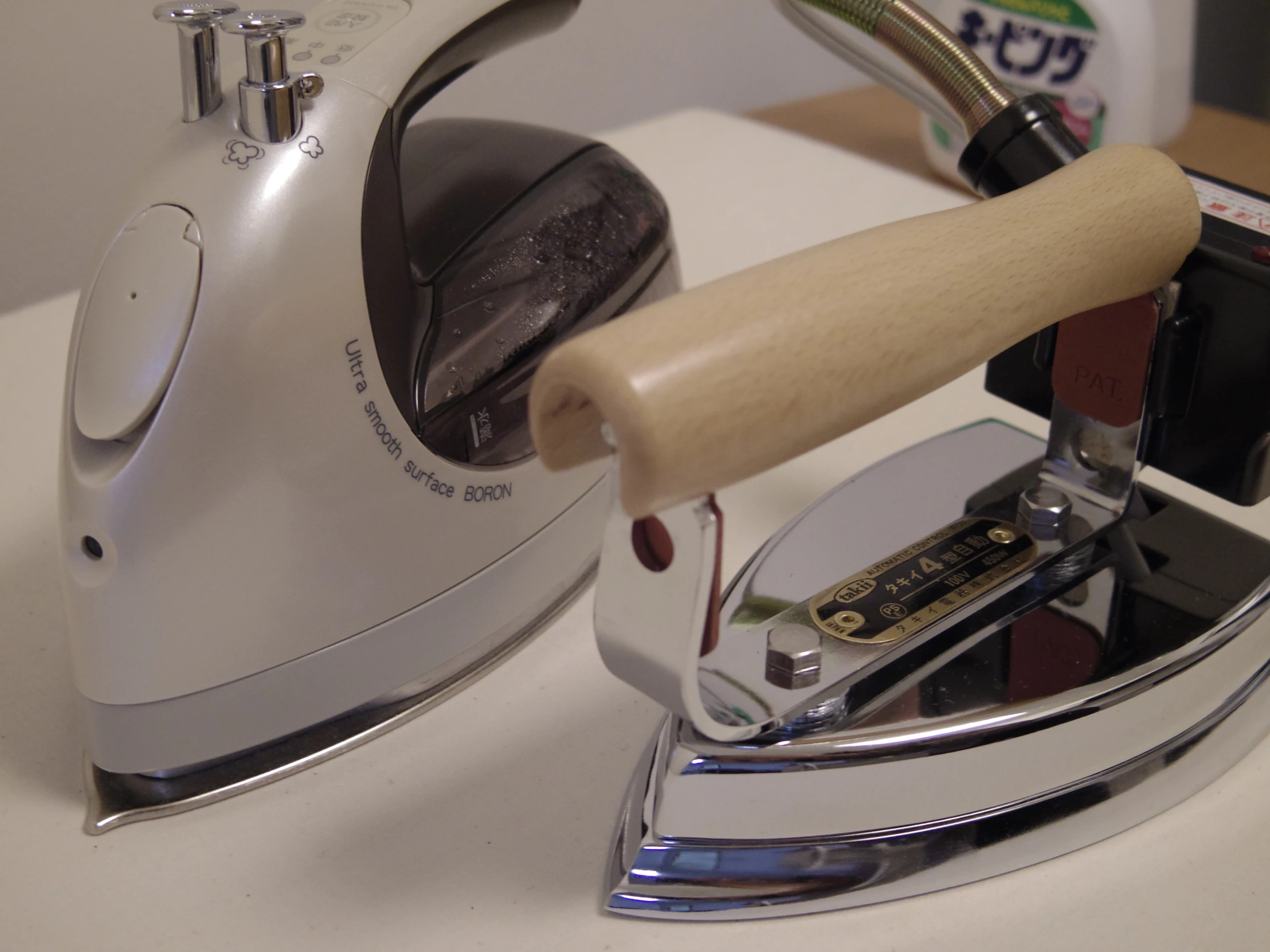 an iron sitting on top of a counter top