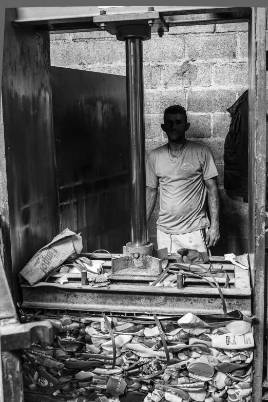 a man looks at himself through the window of a brick - built home