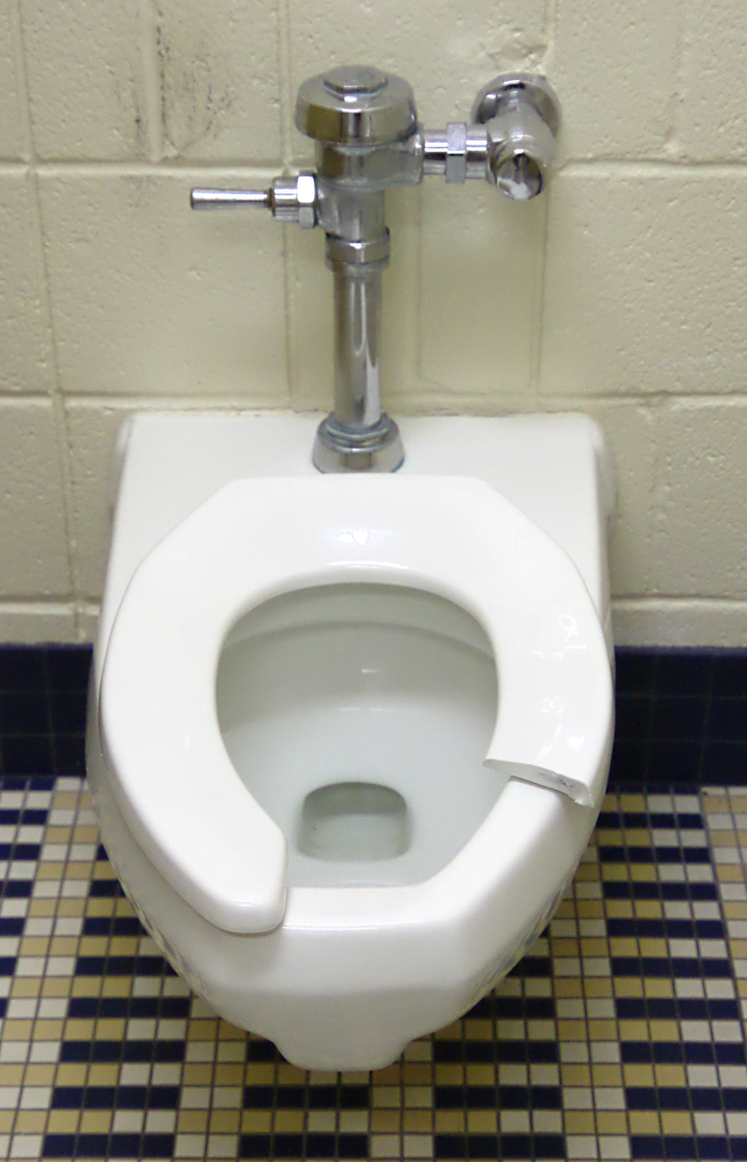 a close up view of a toilet in a bathroom