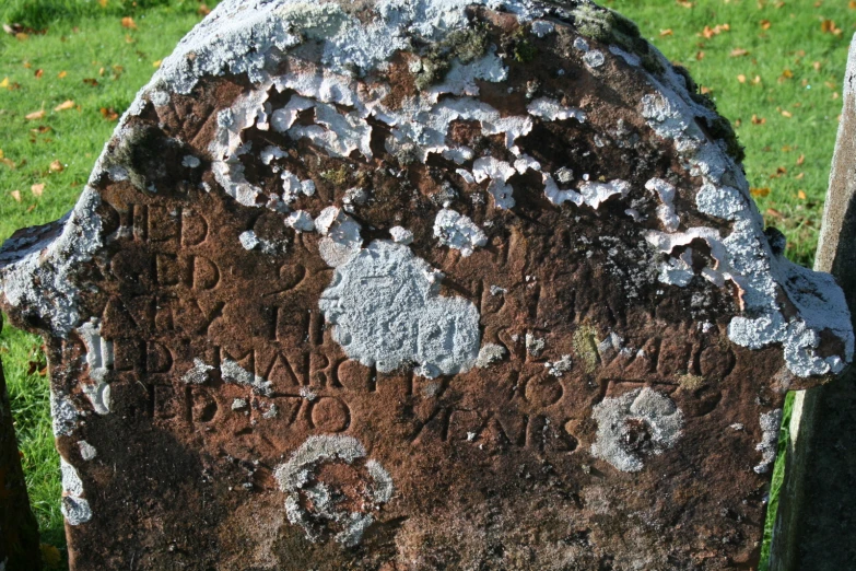 a close up of an old type of stone