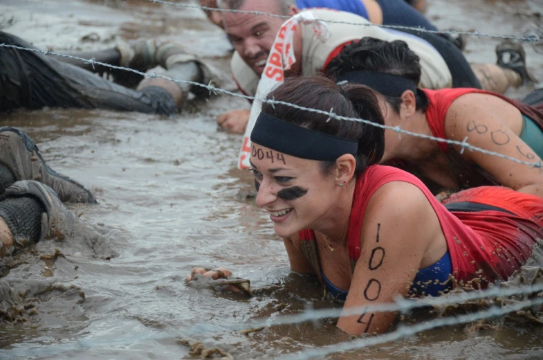 a group of people who are standing in the water