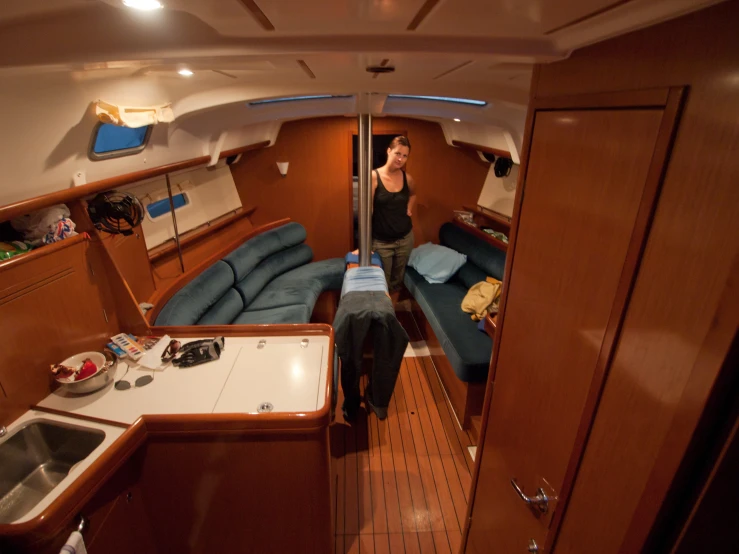 woman sitting in a room with her boat on the water