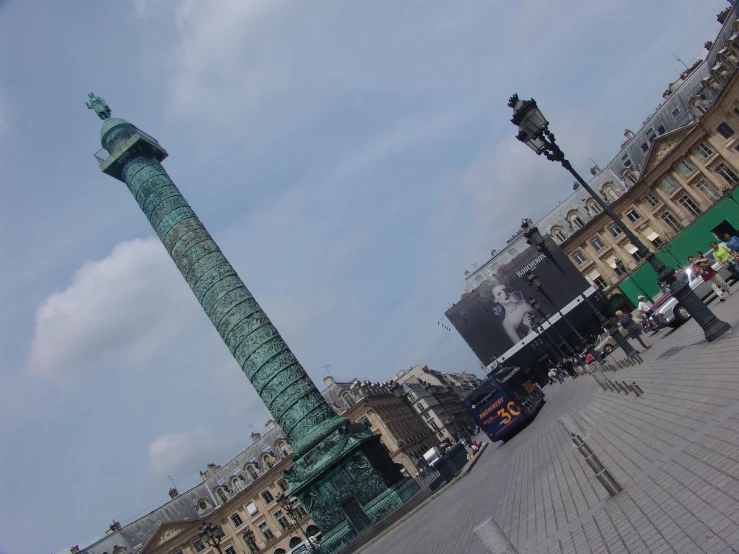 the clock tower is in front of people