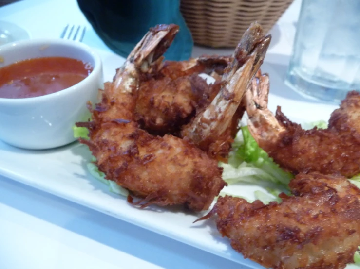 a white plate filled with food sitting on a table