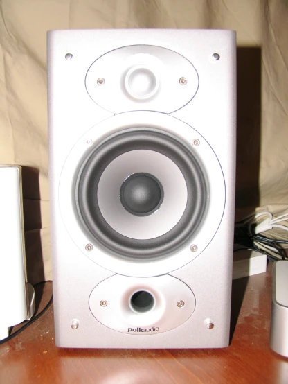 an angled view of a very large, white speaker