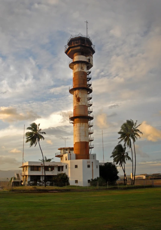 a large tower that is sitting on the grass