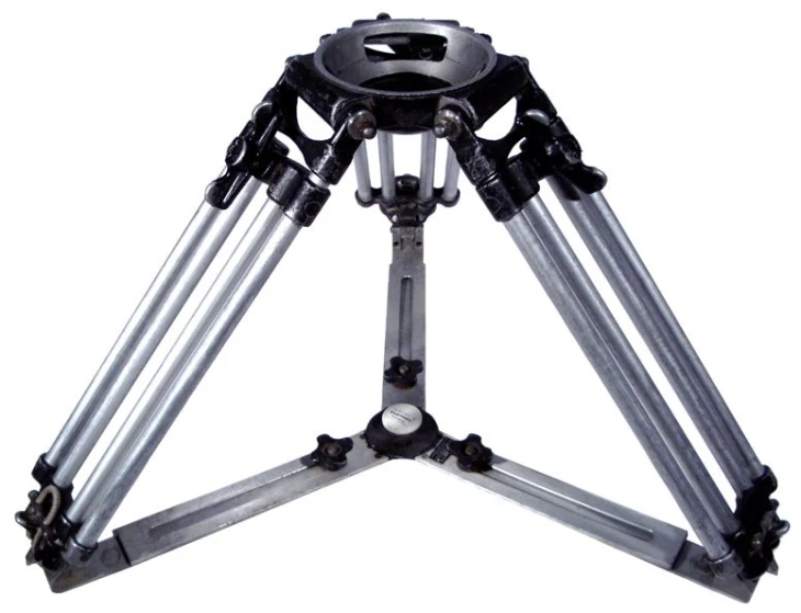 a tripod with multiple gears is standing upright