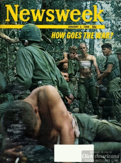 a magazine cover featuring soldiers in uniform talking to one another