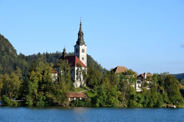 a big tall building sitting on top of a small island