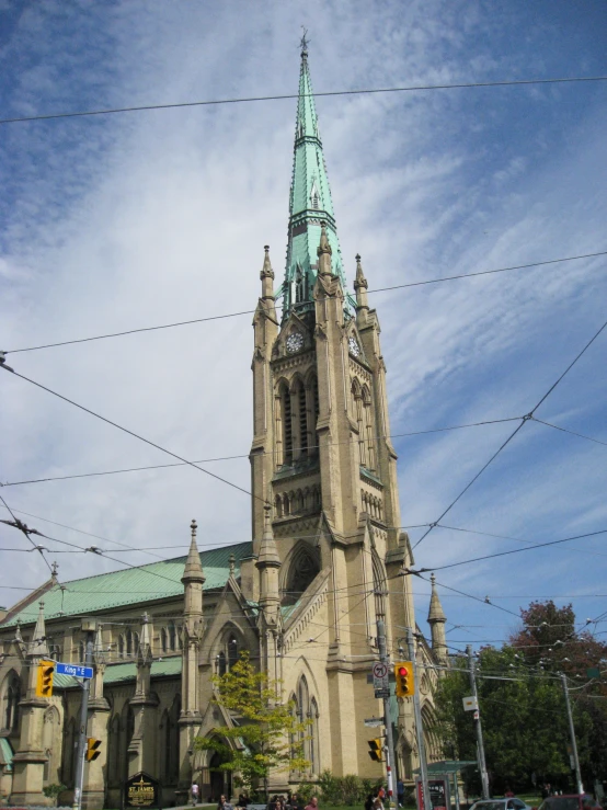 the large cathedral has a clock on its tower