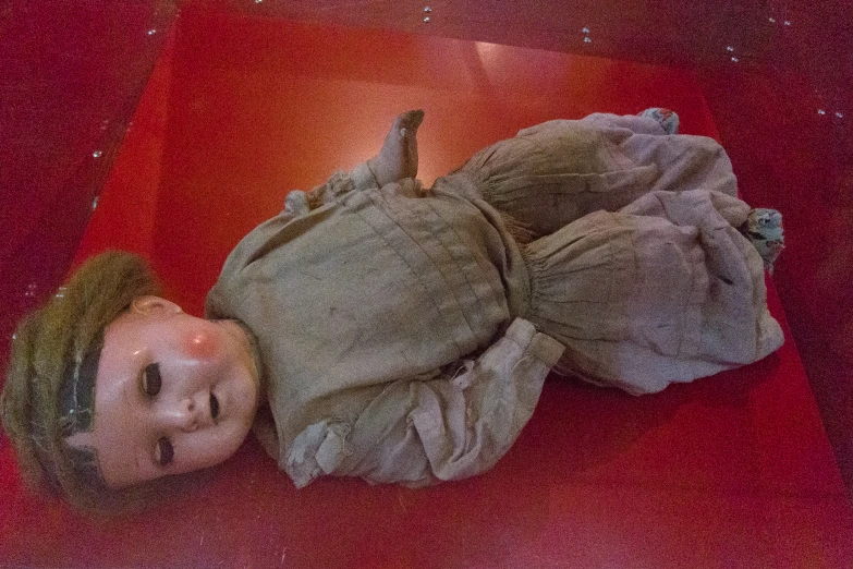 a child's face is shown on top of the bed