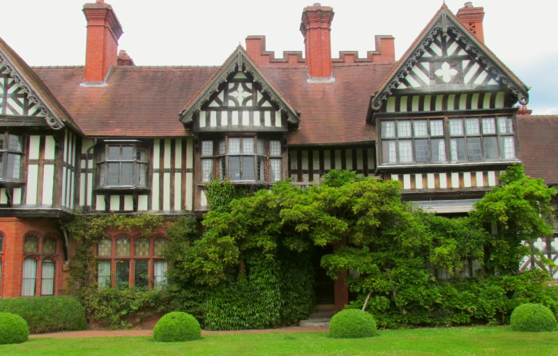 the facade of an old, brick and stone building