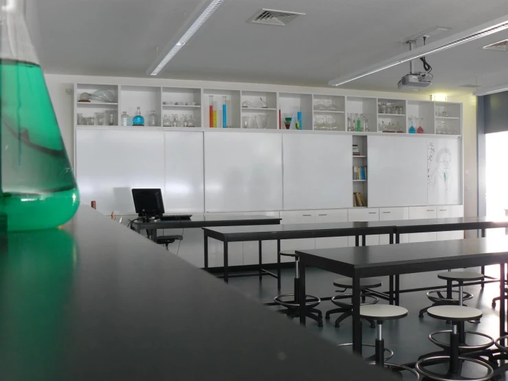 empty tables and benches in a large open room