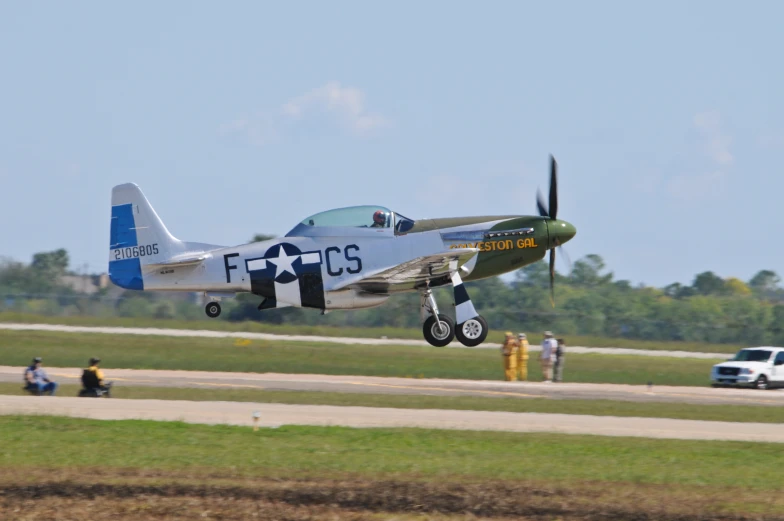 an airplane is taking off on the runway