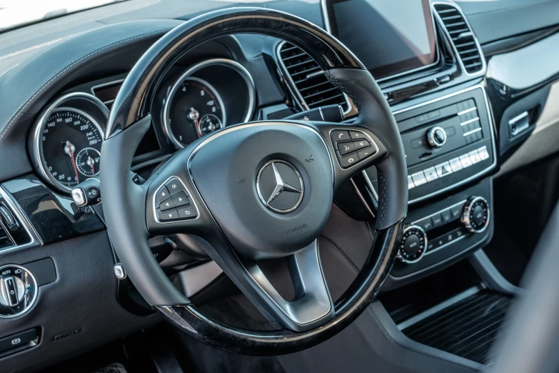 the dashboard of a car shows electronic and modern features