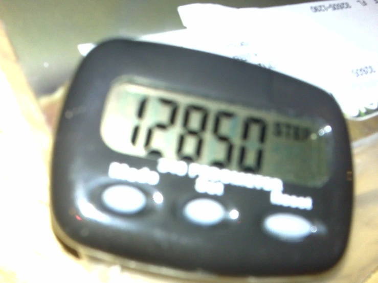 a closeup view of a digital clock on a counter