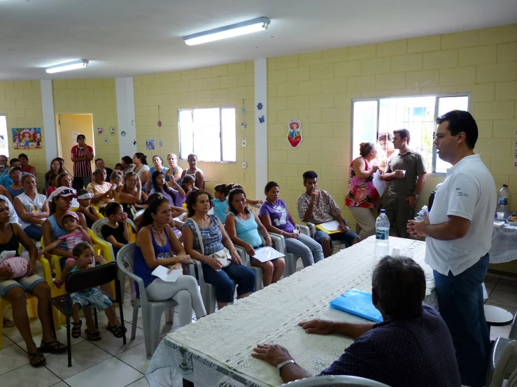 a crowd of people at the beach resort