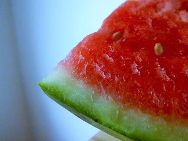 a green section of a slice of watermelon