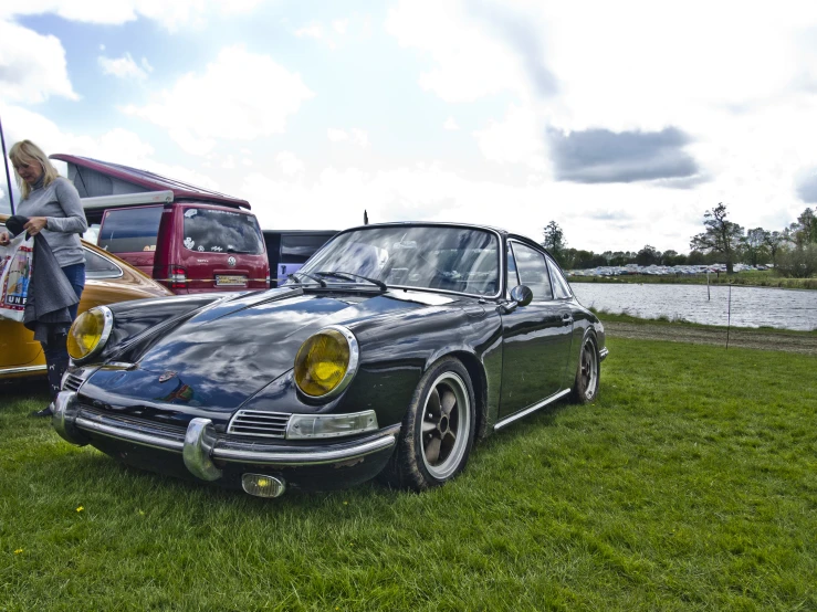 there are two different color porsches that one might have been in the museum