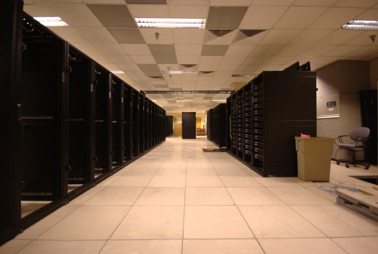 a long hallway of a large data center