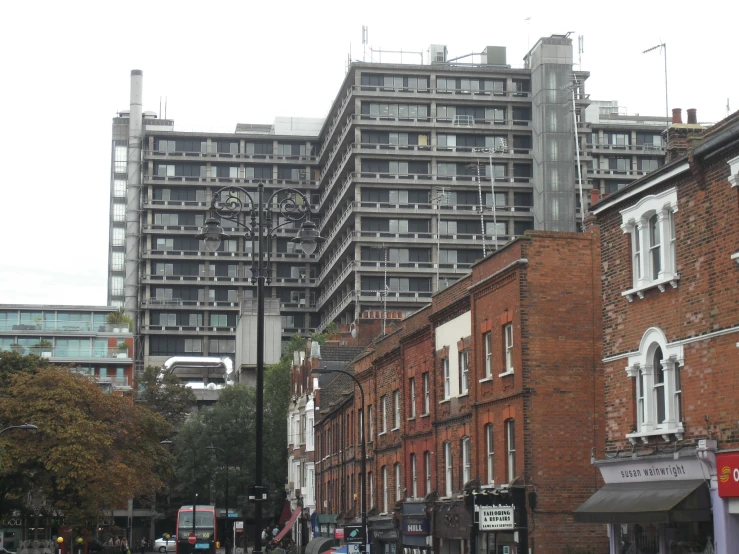 a large, modern building in the middle of a city