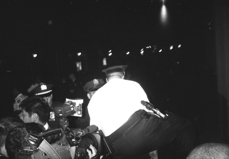 people at a concert in front of microphones and lights