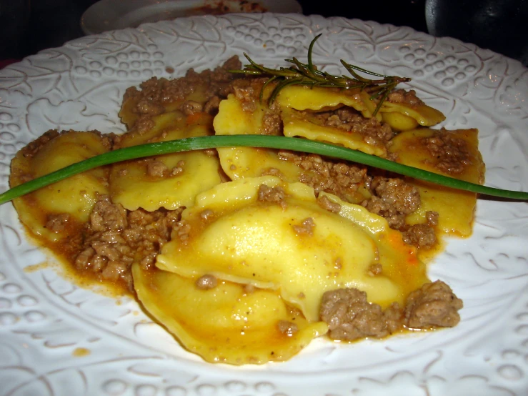 plated meal on decorative white table cloth