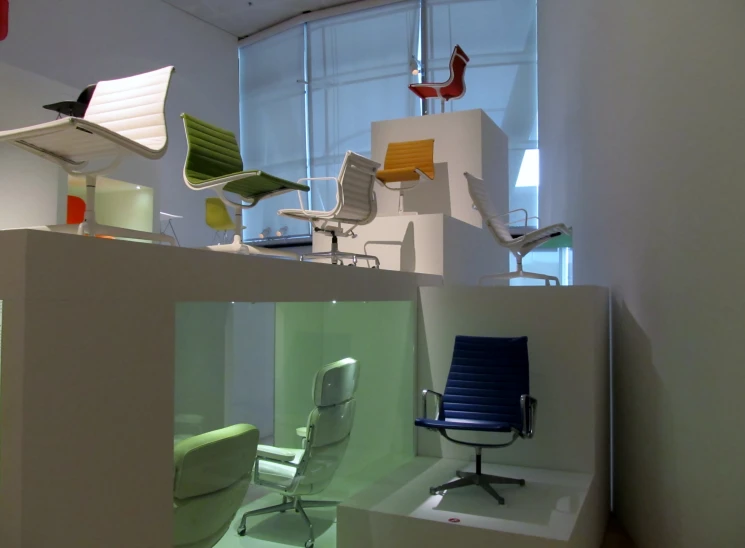 colorful office chairs are arranged around an individual's room