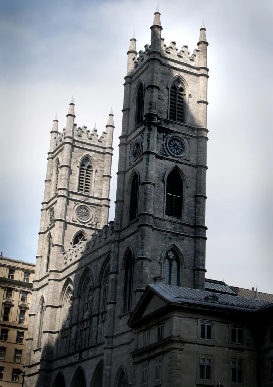 an old gothic church with an arched window