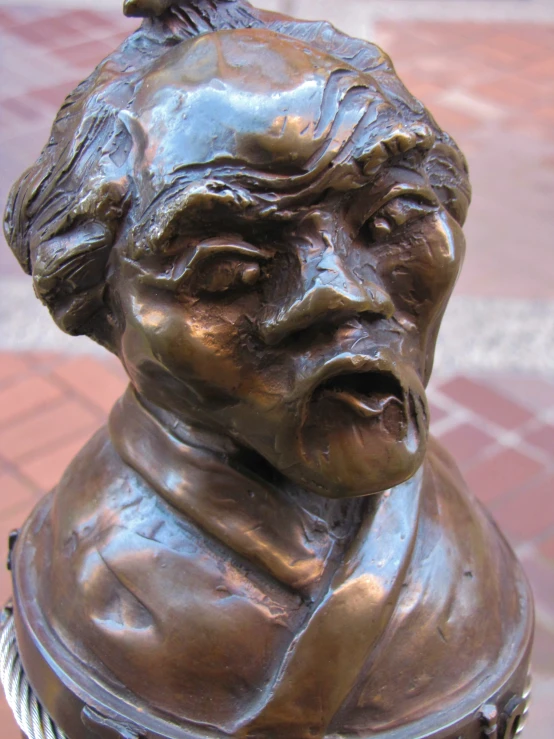 a close up of a statue on the ground