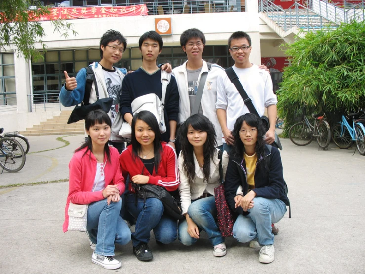 a group of young people posing for a picture