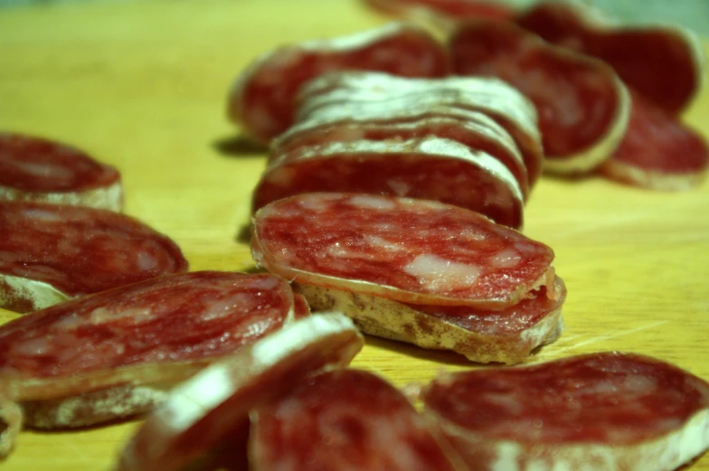 a group of uncooked meaty items sit together