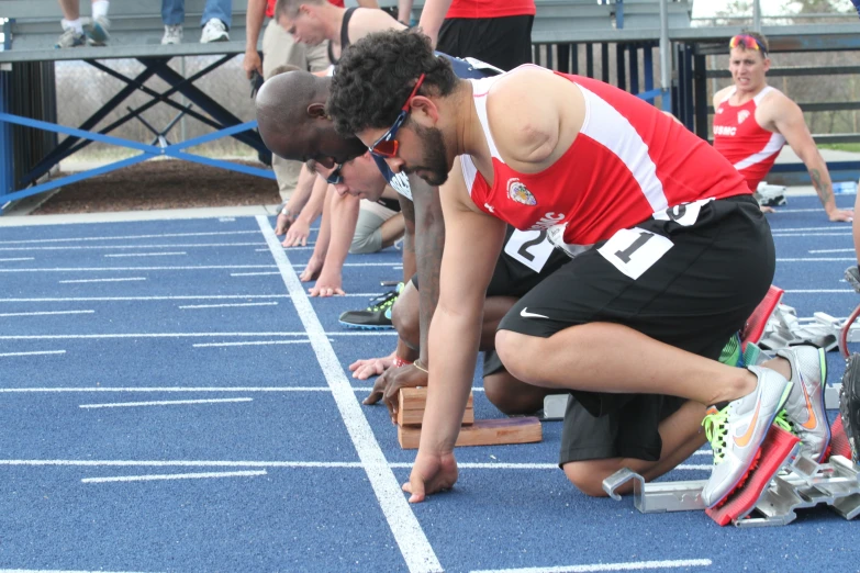 a man and a woman looking at soing while on the track